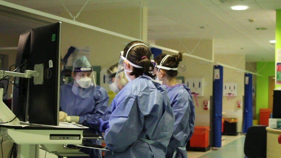 A generic photo of hospital staff in hospital