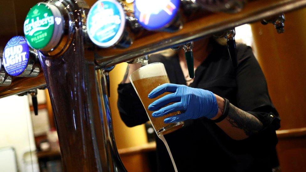 Worker at Wetherspoons pub