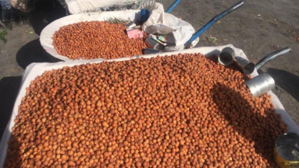 Berries on sale in a wheelbarrow