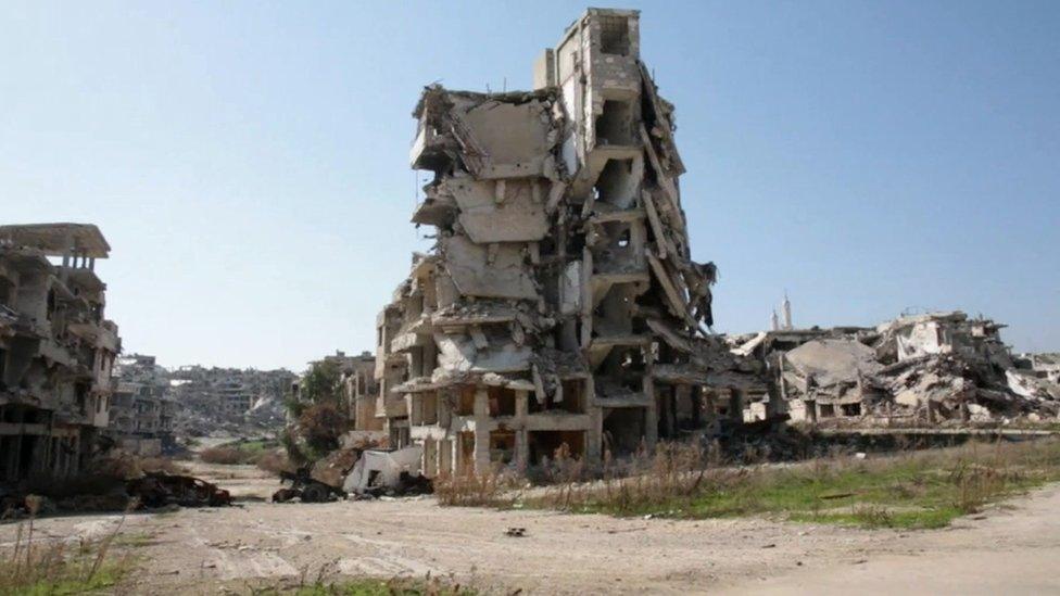 Destroyed buildings in the besieged Damascus suburb of Darayya