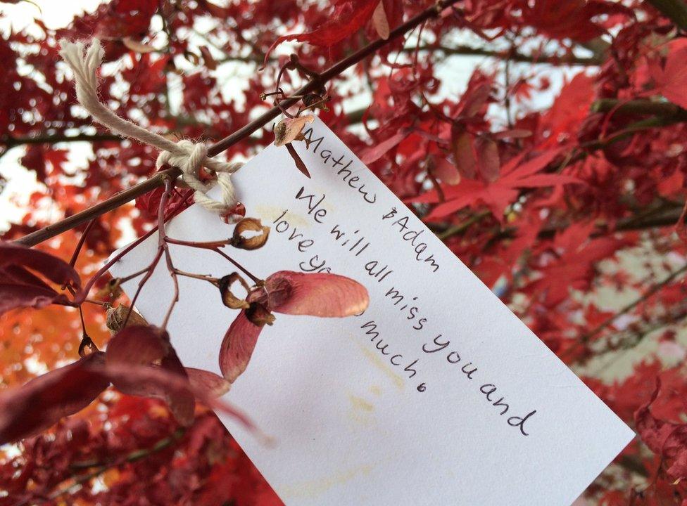 Tribute on tree outside St Peter's Church