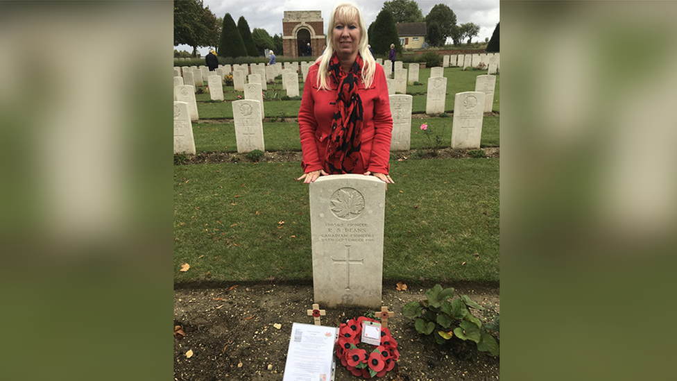 Gwyneth Jones behind grave