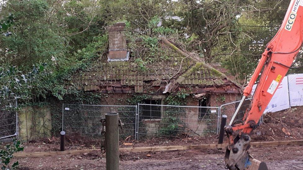 Derelict house uncovered during construction