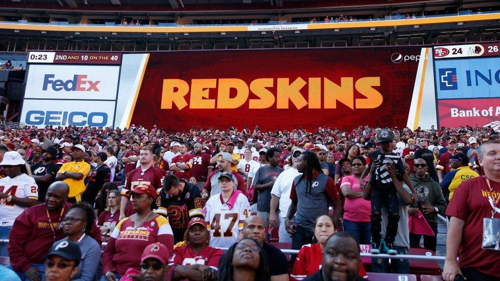 Redskins stadium sign next to FedEx logo