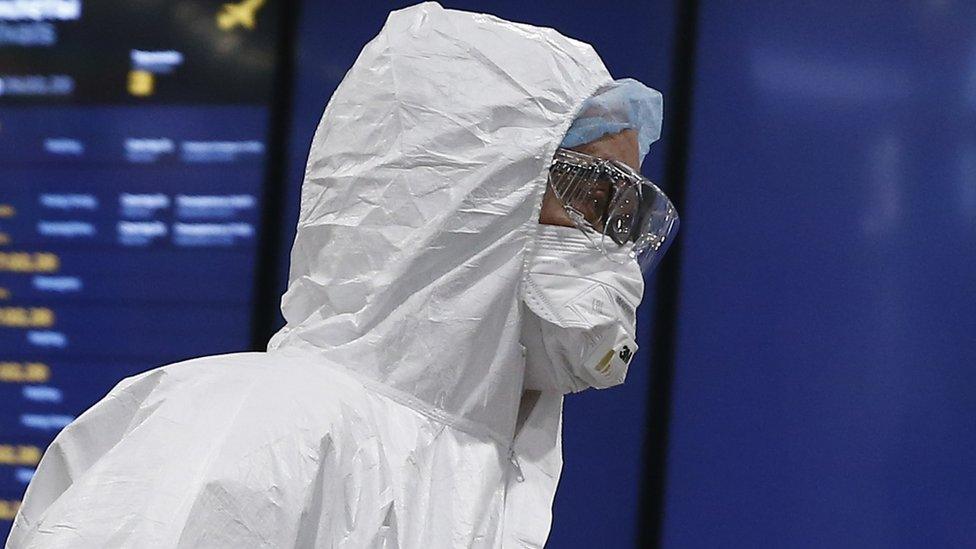 Man in protective suit