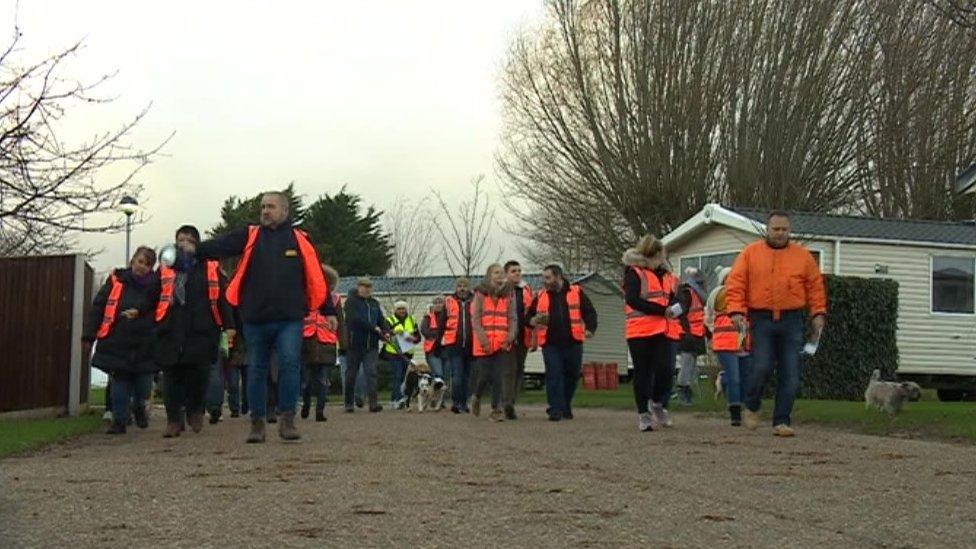 Empty caravans at the Hopton Holiday Village in Great Yarmouth were searched by volunteers in the afternoon