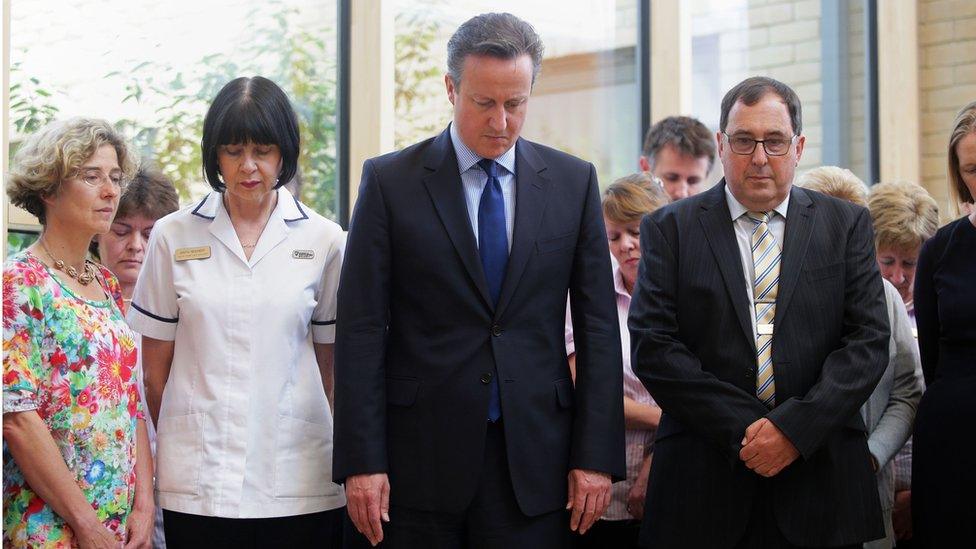 David Cameron observes silence