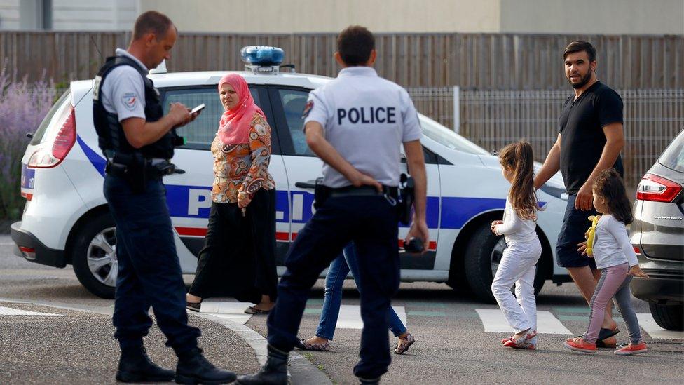 Police officers on the streets of Saint-Etienne-du-Rouvray