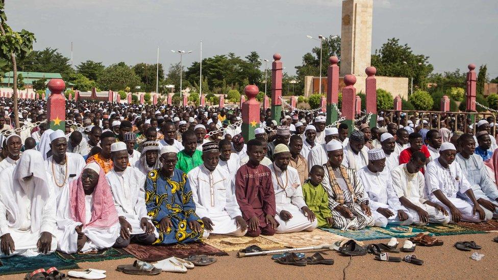 Muslims pray for the Eid al-Fitr at the place de la Nation in Ouagadougou, Burkina Faso