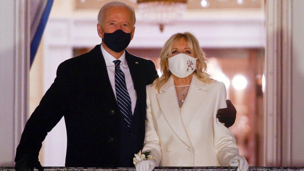 President Joe Biden and first lady Jill Biden watch fireworks from the White House