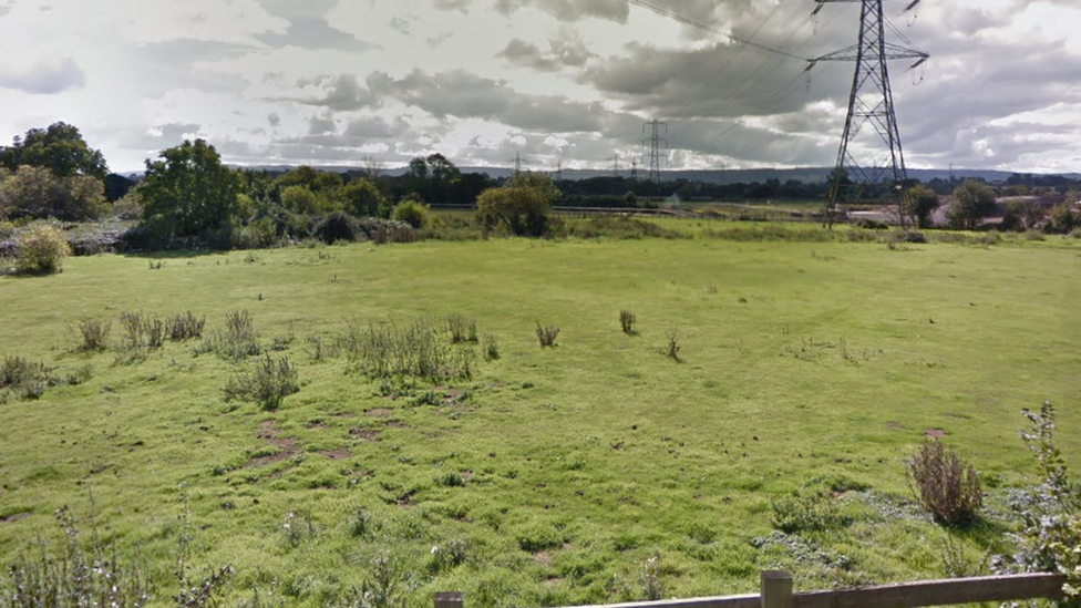 An open view of the field where houses might be built