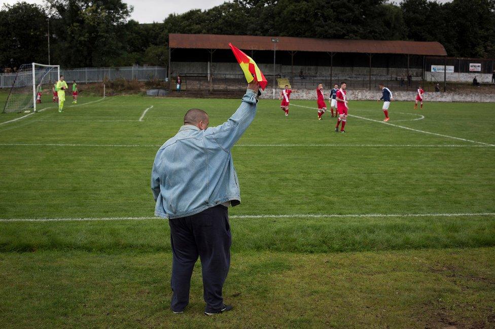 One of the backroom staff acting as a lineman at Millburn Park