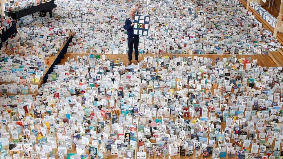 Tom Moore's birthday cards on display at a local school