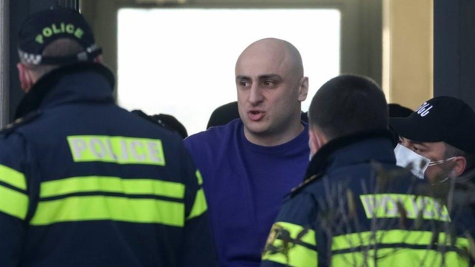 Georgian law enforcement officers detain opposition leader Nika Melia after storming the party offices in Tbilisi, Georgia on 23 February 2021