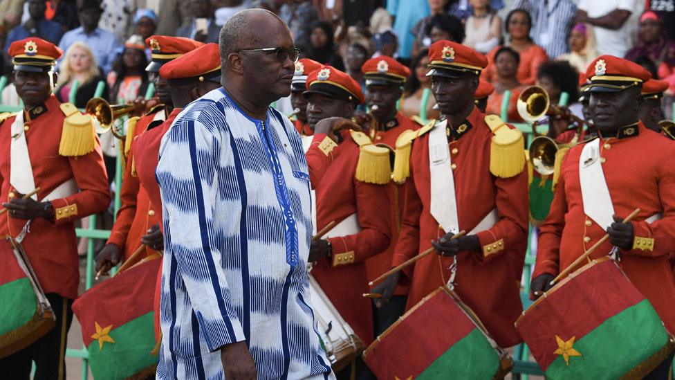 Burkina Faso's President Roch Marc Christian Kabore arrives for the opening ceremony of the FESPACO Panafrican Film and Television Festival of Ouagadougou, in Burkina Faso, on February 23, 2019