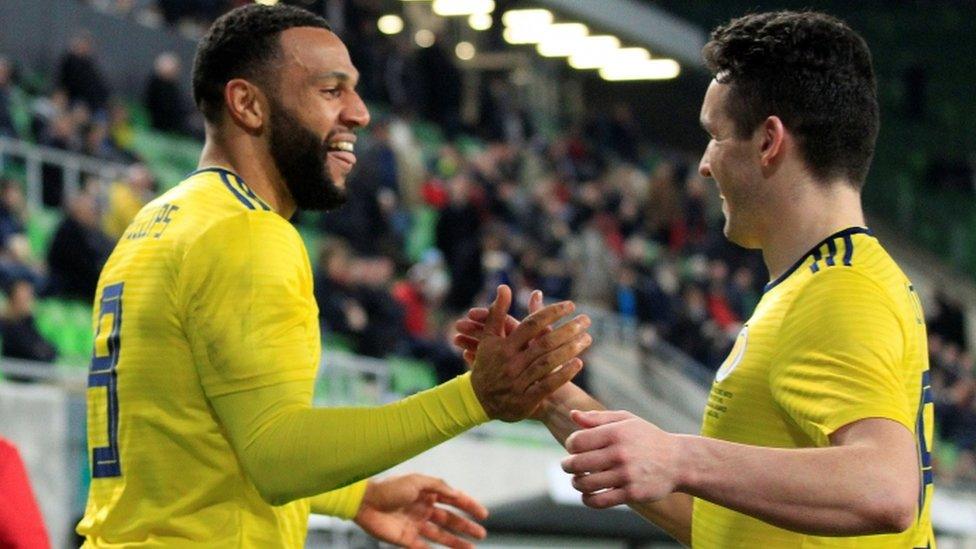 Matt Phillips celebrates scoring for Scotland with John McGinn