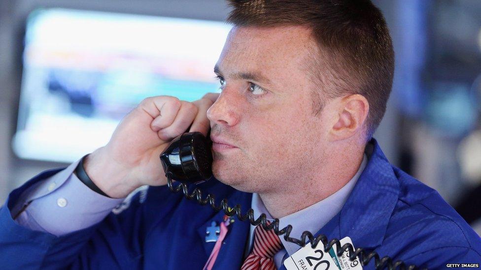 A trader at the New York stock exchange