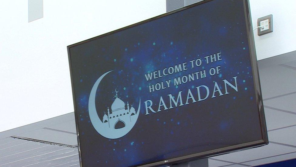 Sign reading "welcome to the holy month of Ramadan