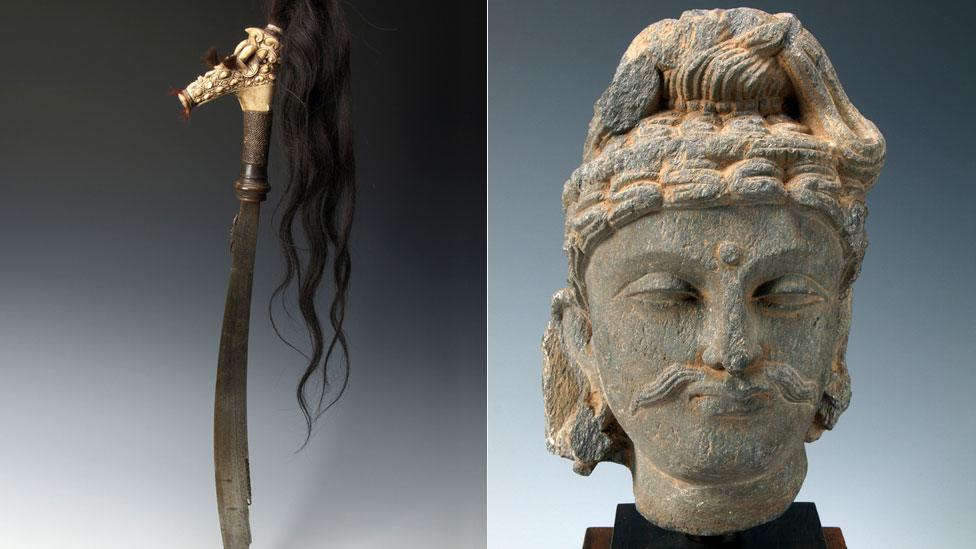 Headhunting sword and sculpture of a Bodhisattava