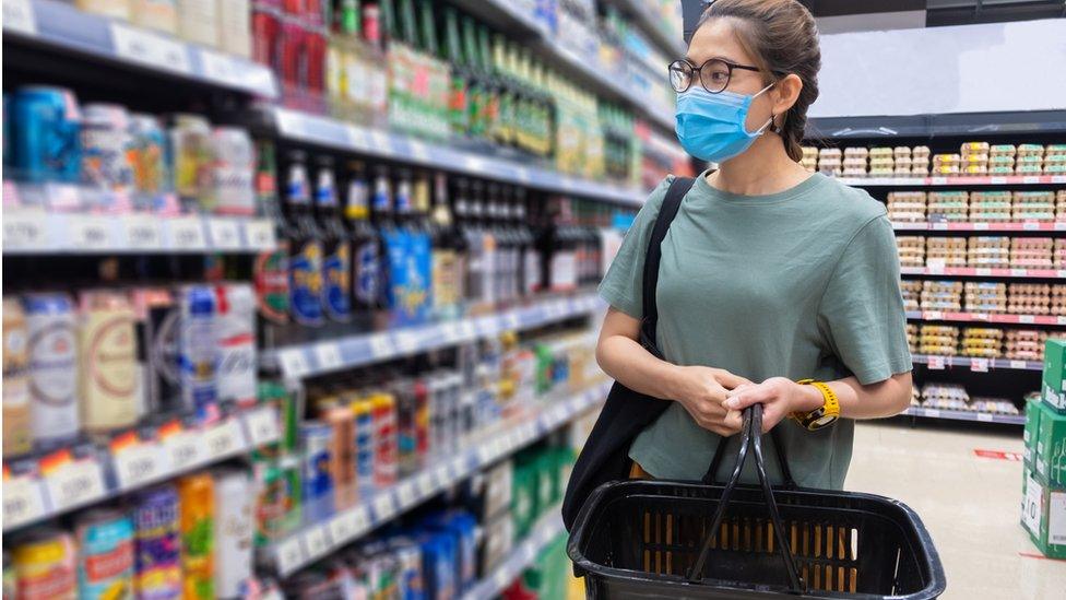 Woman shopping for alcohol