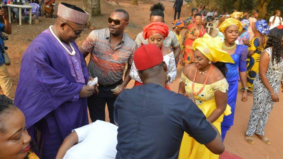 A family member felicitate with the couple