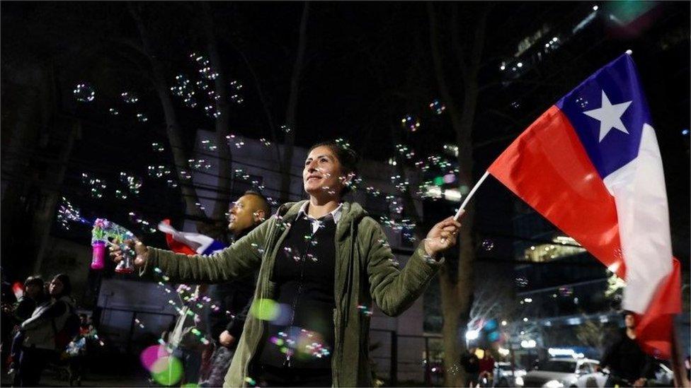 A supporter of the reject option reacts to the results of the referendum on a new Chilean constitution in Santiago, Chile, September 4, 2022.