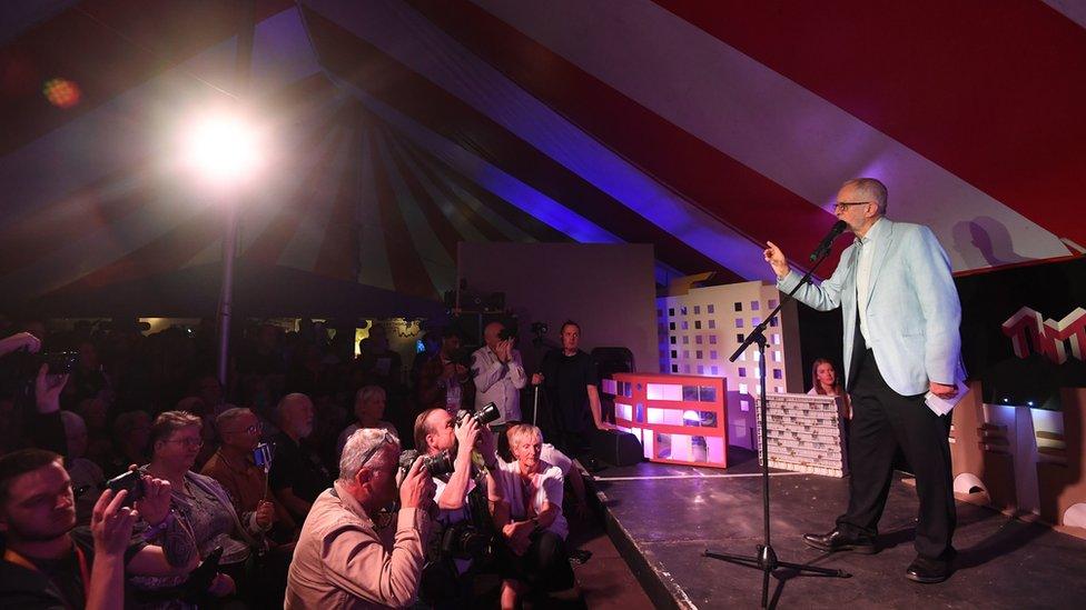 Labour leader Jeremy Corbyn speaks at the The World Transformed (TWT) opening rally at the Old Steine Gardens during the Labour Party Conference in Brighton