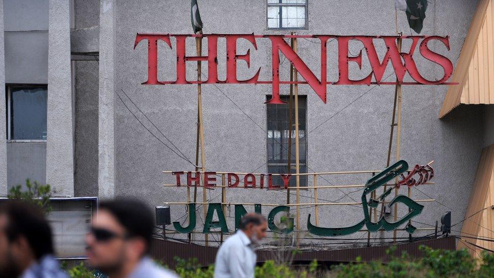 This picture taken on June 28, 2018, shows the facade of the leading daily Pakistan's newspapers "The News" in English and "Jang" in Urdu languages in the garrison city of Rawalpindi.