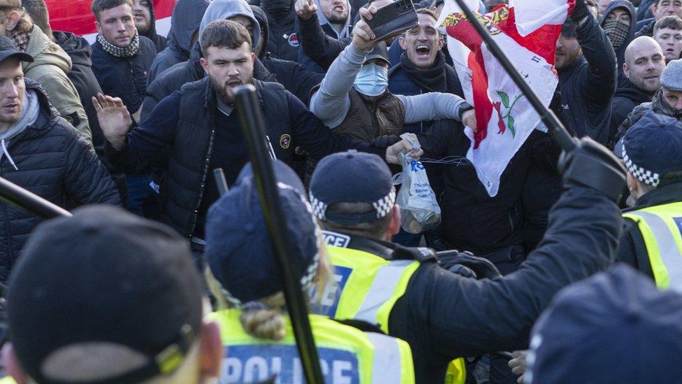 Counter-protesters clash with police in Parliament Square in central London, during a pro-Palestinian protest march.