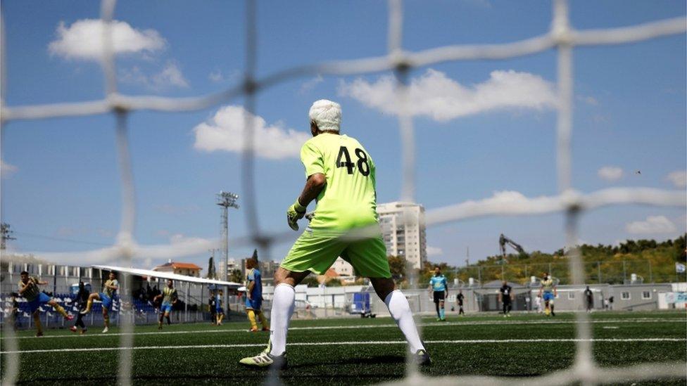 Isaak Hayik, the world's oldest football player, seen playing for his team Ironi Or Yehuda