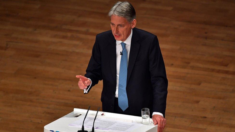 Chancellor of the Exchequer, Philip Hammond, delivers a speech about the economy on the second day of the Conservative Party Conference 2016 at the ICC Birmingham on October 3, 2016 in Birmingham, England.