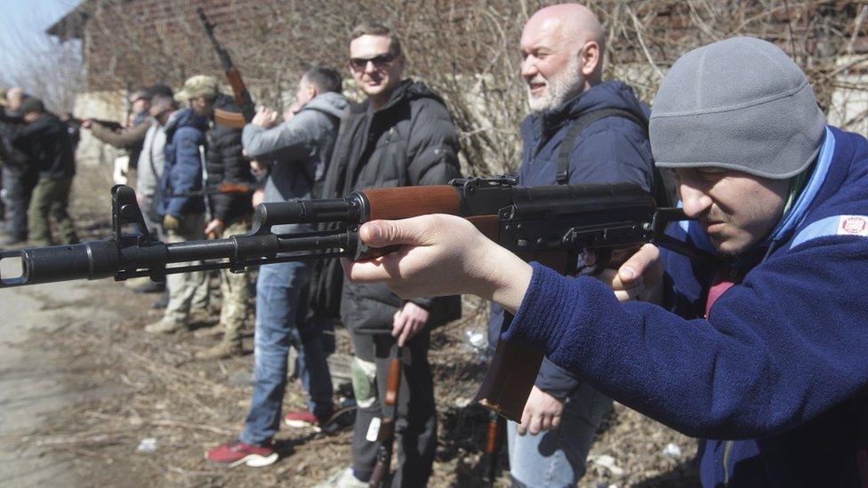 Ukrainian volunteer soldiers are trained to use weapons in Odesa