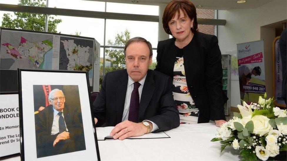 Signing a book of condolence for Ian Paisley in 2014