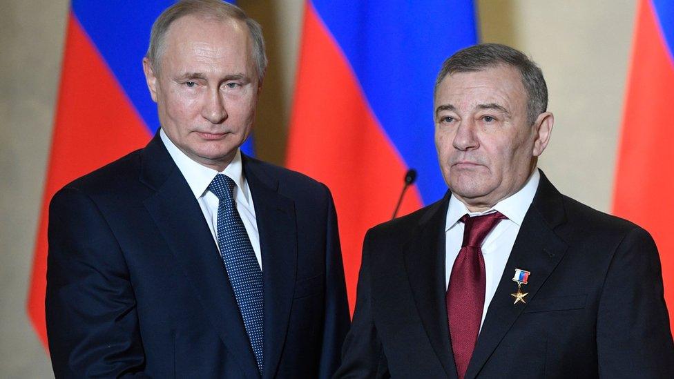 Russian President Vladimir Putin decorates businessman Arkady Rotenberg on March 18, 2020