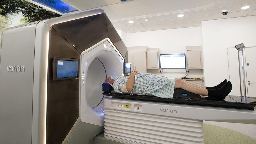 Patient going into AI scanner