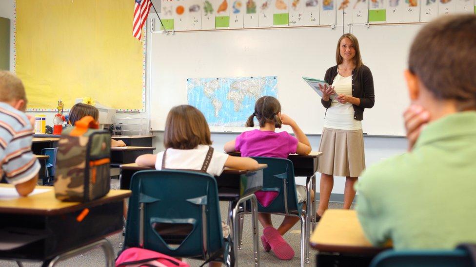 Teacher and pupils