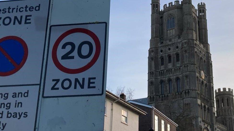 20mph sign with Ely Cathedral in background