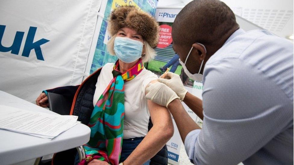 Woman being vaccinated