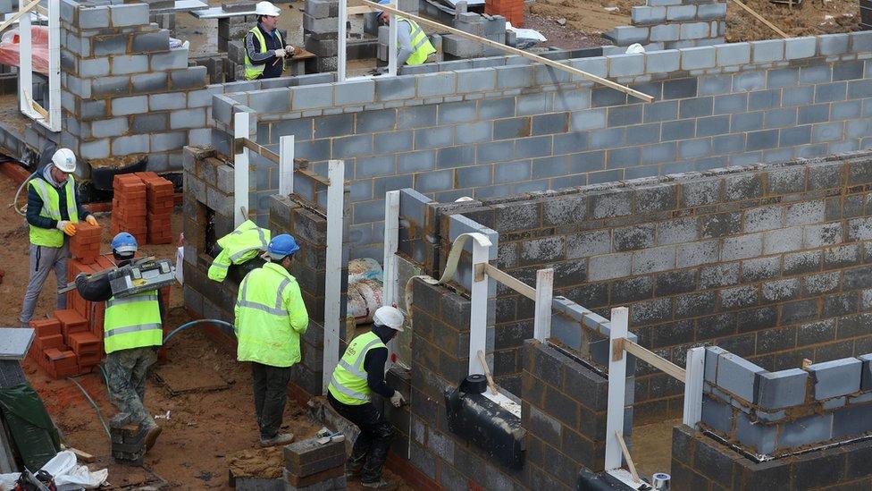 Workers on a building site