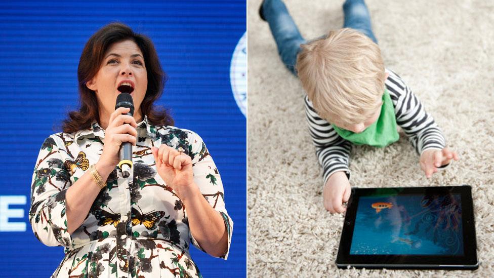 Kirstie Allsopp and child with iPad