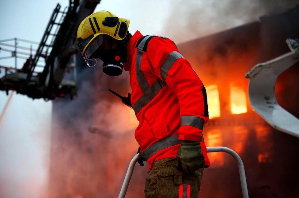 Firefighter at Maple Mill fire