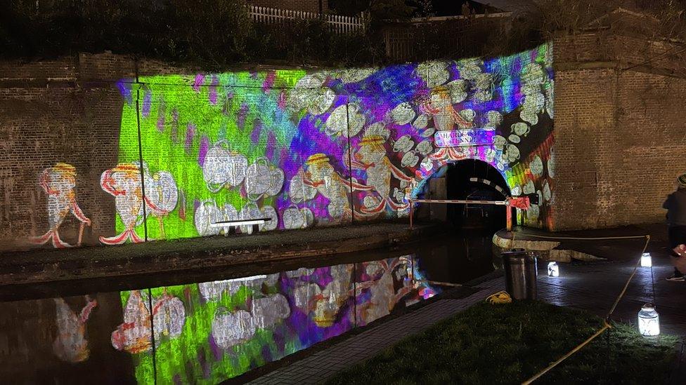 Light projection on a railway tunnel