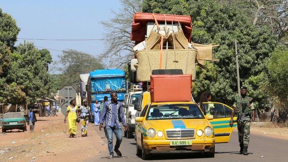 Cars line up at the border post check point in Seleki, Senegal, at the border with Gambia January 17, 2017.