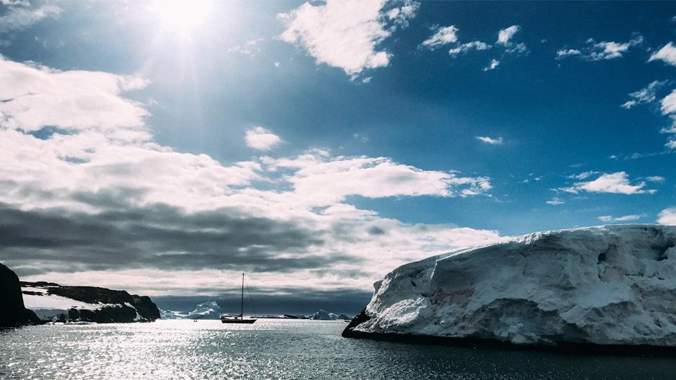 Scenic view of sea against sky during winter,Antarctica