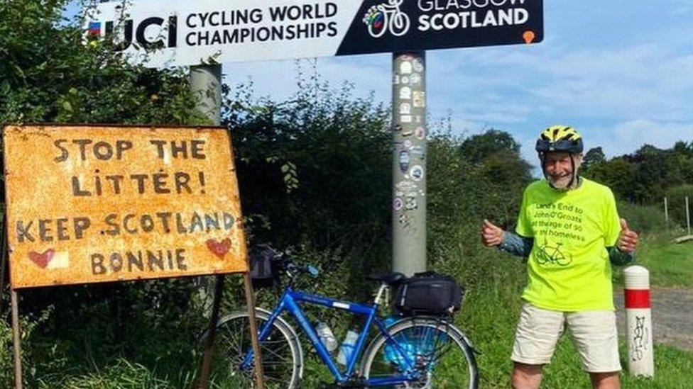 Peter Langford next to Scotland sign