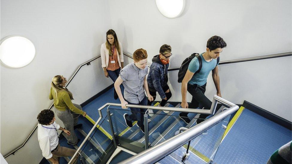 secondary pupils coming up stairs