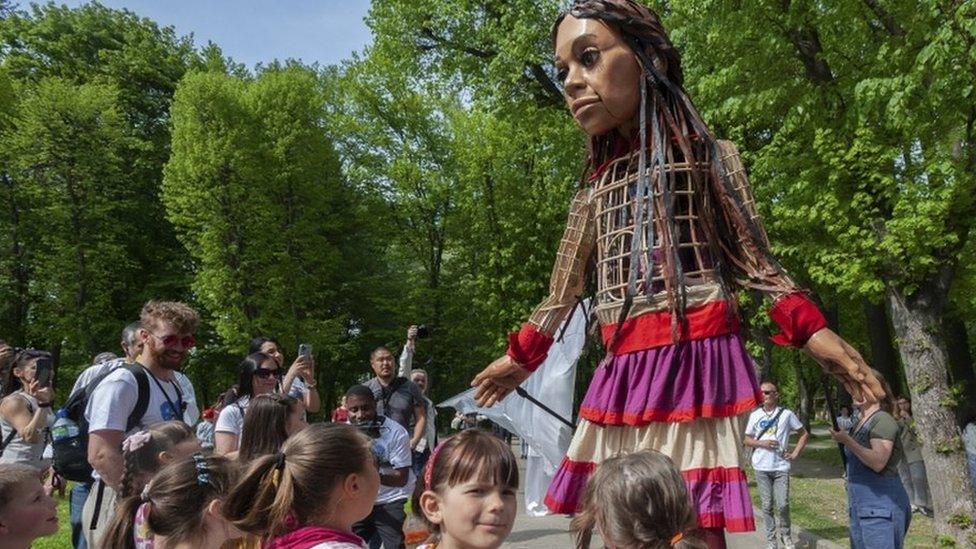 Little Amal meeting children