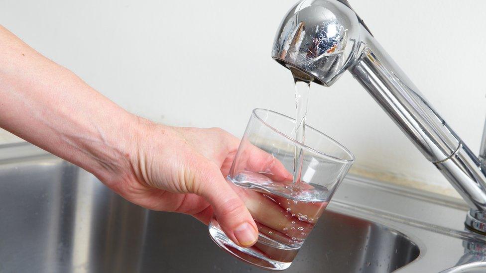 Water flowing from tap