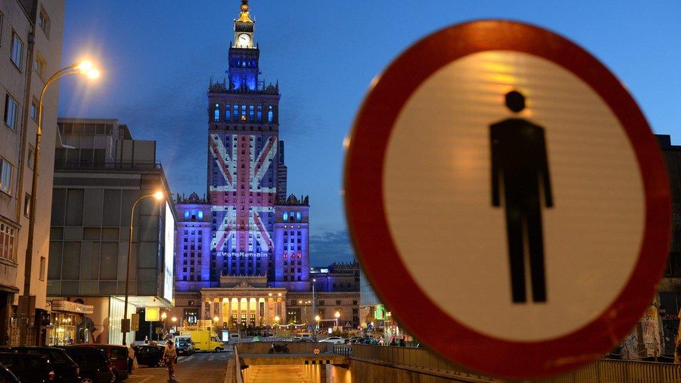 The British flag is displayed on the facade of the Palace of Culture and Science in Warsaw, Poland, 22 June 2016