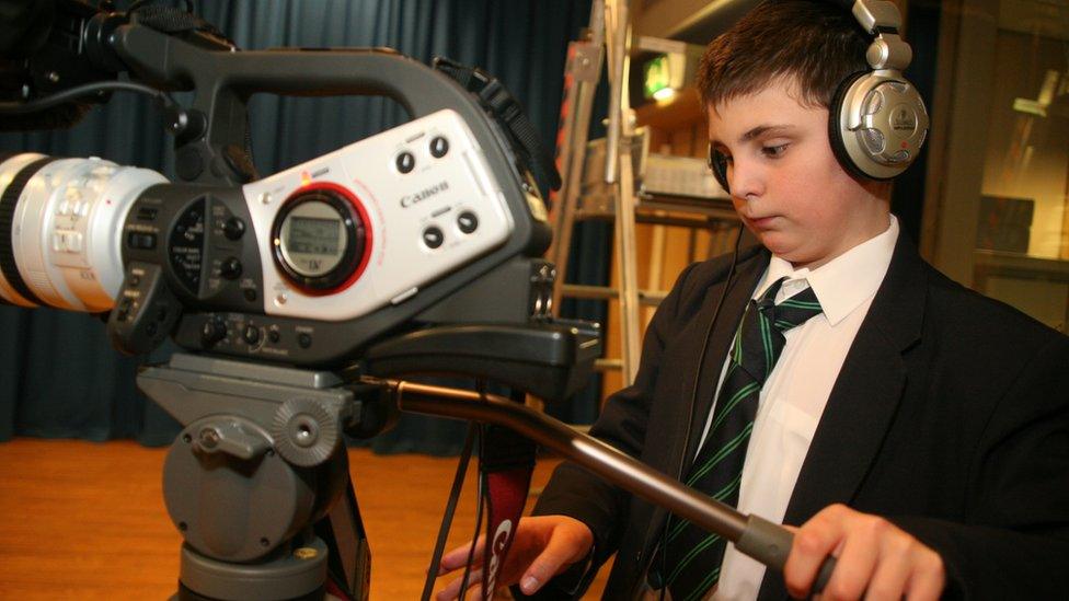 Boy using camera